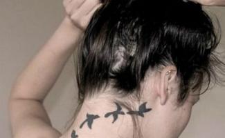 Women's neck tattoos