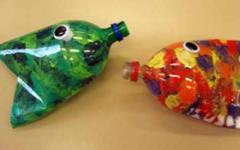 Volumetric fish made of colored paper Crafts of fish from different materials